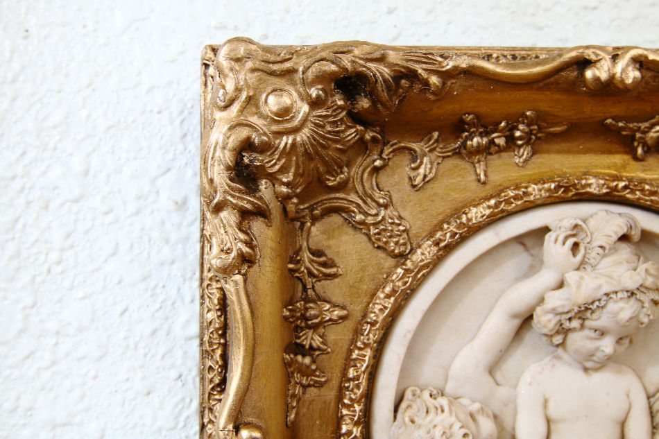 Three cherubs playing / plaque picture