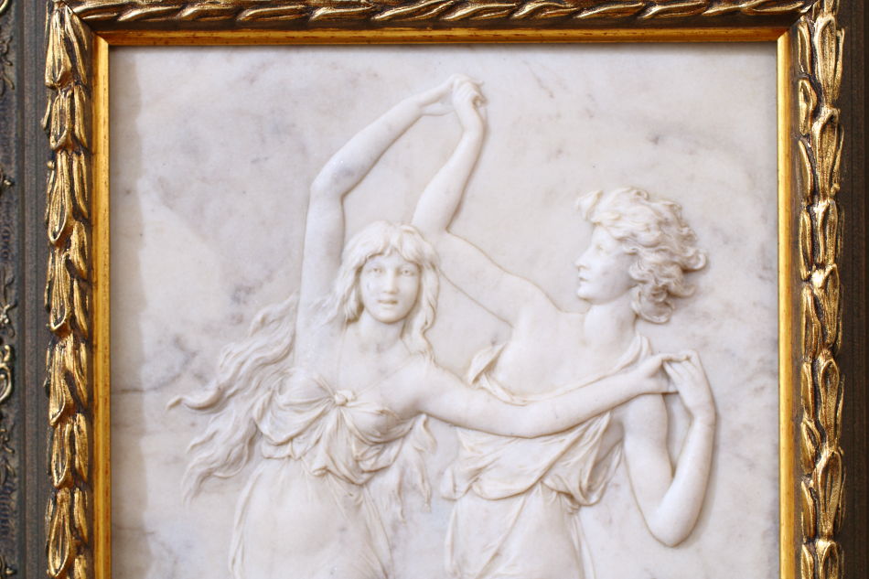 A mythical design of two dancers / plaque picture